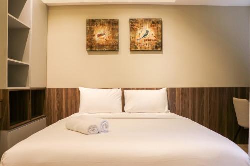 Duren Sawit Apartment | Simply Look Studio Room Gateway Park LRT City Jatibening Apartment By Travelio
