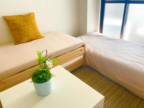 Sumiyoshi Apartment | SIMPLY WHiTE GUEST ROOM302
