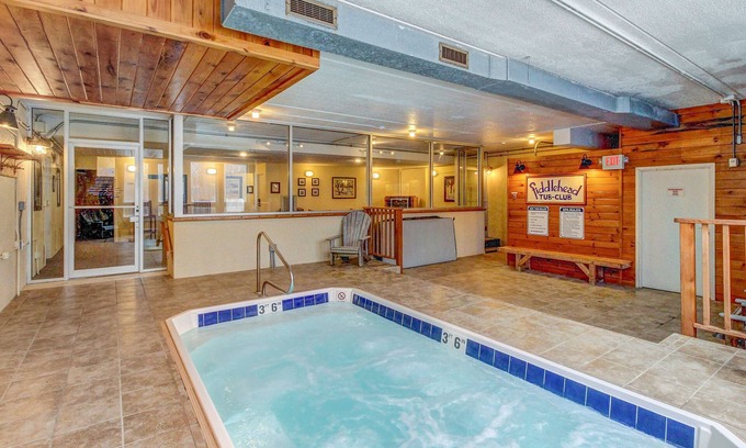 Waitsfield Condo | Ski-in/out condo with pool, hot tub, game room, mountain view, & fireplace