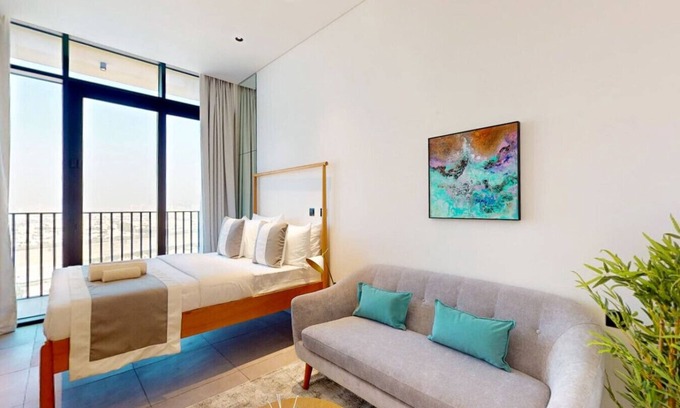 Jumeirah Village Triangle Apartment | Skyline Views: Sunset Studio with Balcony