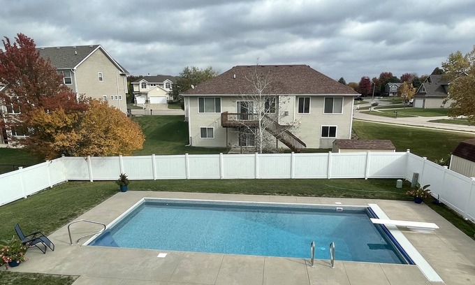 Grimes House | Sleeps 12, spacious, family friendly, with outdoor pool during summer months!