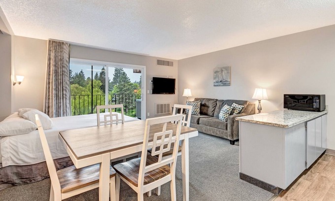Bend Condo | "Slope Floats" Downtown Riverfront Condo. Best location in Bend!