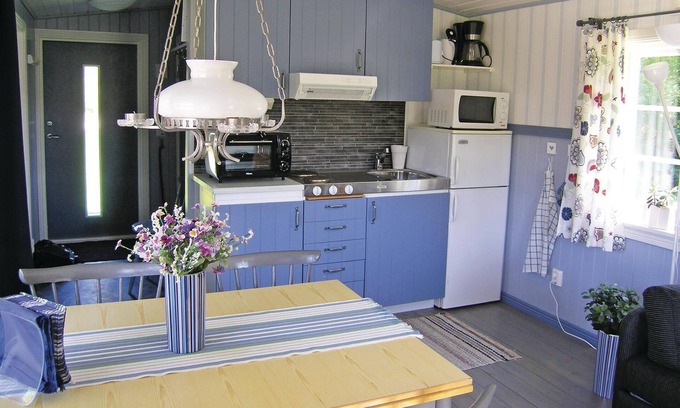Sjotofta House | Small, well used cottage with terrace at the back.