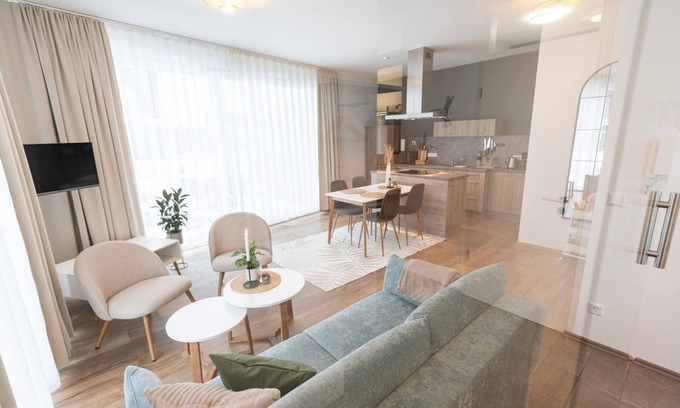 Bad Zwischenahn Apartment | SmartFewo: Windbreaker | Terrace | Sauna | Park - Residence by the small sea