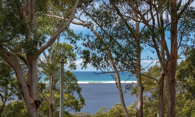 Smiths Lake House | Smiths Lake, rainforest canopy and Sandbar Beach Views. Fab home for 10 guests.