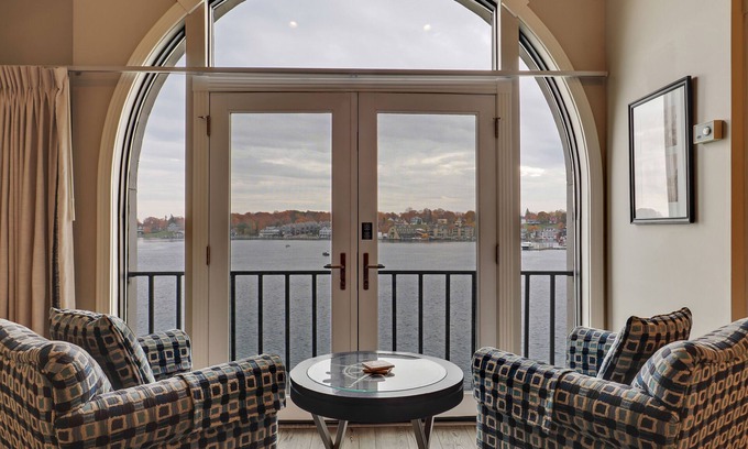 Charlevoix Condo | Soaring Ceilings & Lake Views | Downtown Charlevoix | Pool, Hot Tub, Sauna
