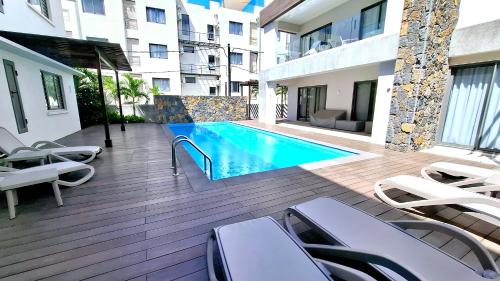 Pereybere Apartment | Soleia 2 - Pereybere - Appartement Cozy avec piscine proche plage