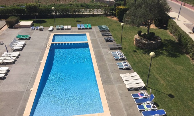Cala Bona Apartment | South Facing Penthouse Apt 100m to beach, Mountain Views, WiFi, Roof Sun Terrace