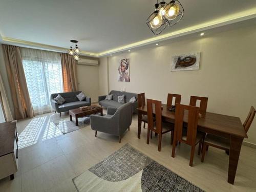 Sheikh Zayed City Apartment | Spacious 3BR Apt, 2 Baths, Gated Community - 903