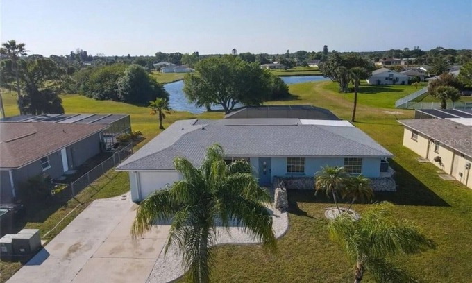 Oakland Hills House | Spacious 4/2 with heated pool and lake view FREE GOLF! Close to gulf beaches!