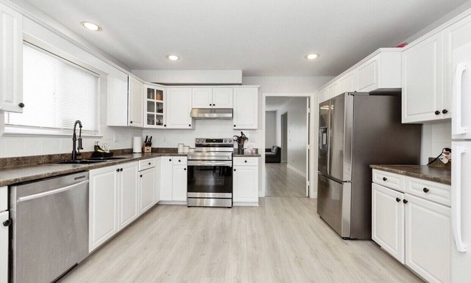 Fleetwood House | Spacious 4 bedroom with covered patio/fireplace