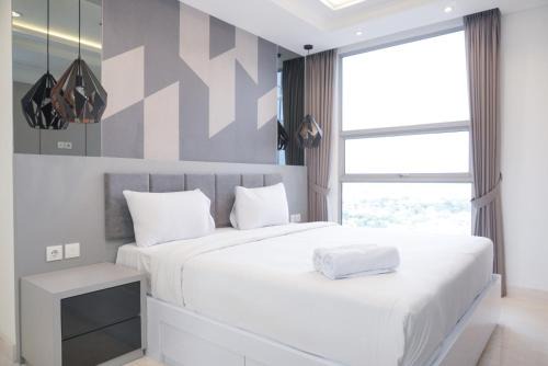 Kebayoran Lama Apartment | Spacious and Elegant 2BR Apartment at The Kencana Residence By Travelio