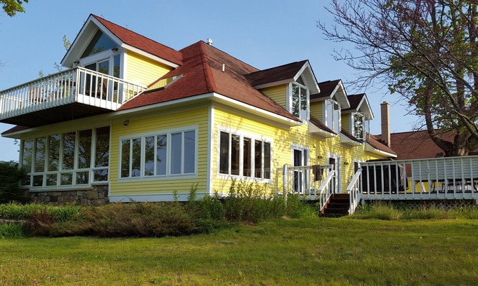 Omena House | Spacious And Peaceful Retreat On Grand Traverse Bay! Private Beach Front
