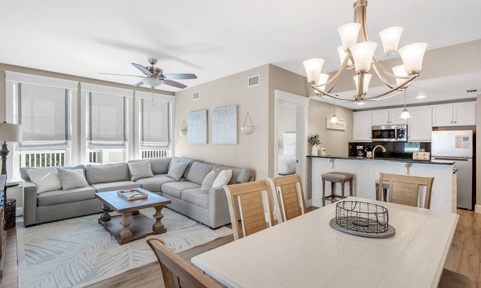 Baytowne Wharf Condo | Spacious Balcony ~ Spacious Living Area ~ Community Pool ~ Outdoor Seating