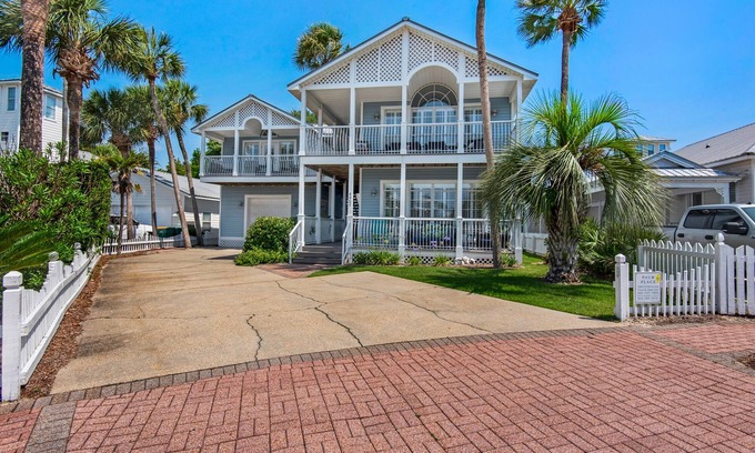 Crystal Shores House | Spacious beach house steps to the powdery white side and emerald water.