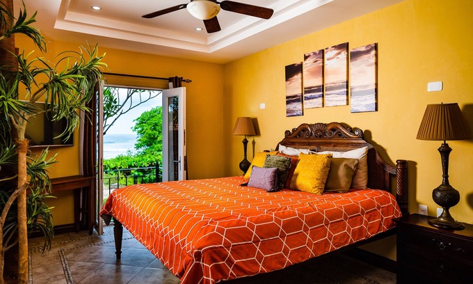 Playa Langosta Villa | Spacious beachfront 2-BR condo with Pool and a stunning sunset view
