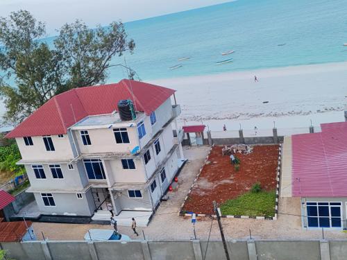 Uroa Apartment | Spacious Beachfront Condo -AC - WiFi, Uroa Escape Zanzibar