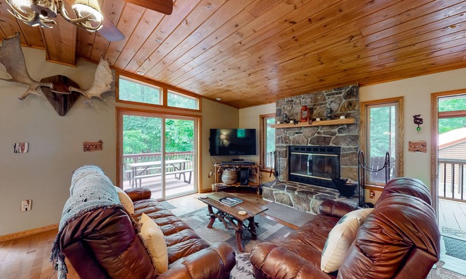 Bloomington House | Spacious forest retreat with grill, firepit, game room, & jacuzzi tub - dogs ok