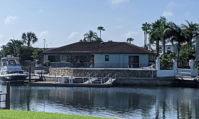 Gulf Harbors House | Spacious Gulf water front 4B/3B, pet friendly & pool. Boat lift not included.