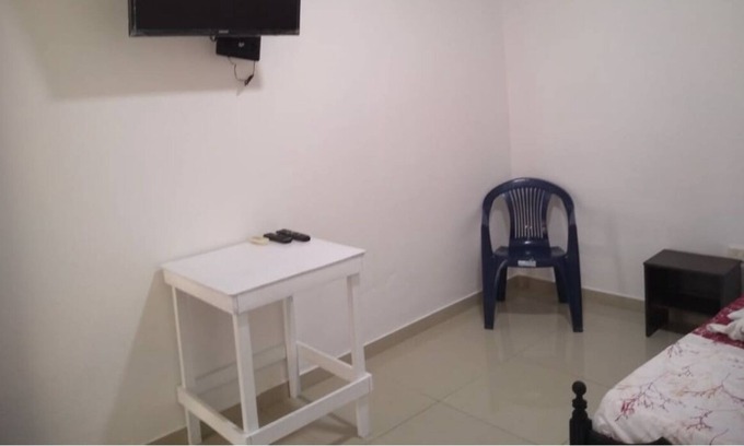Sur Oriente House | Spacious room with air conditioning and private bathroom
