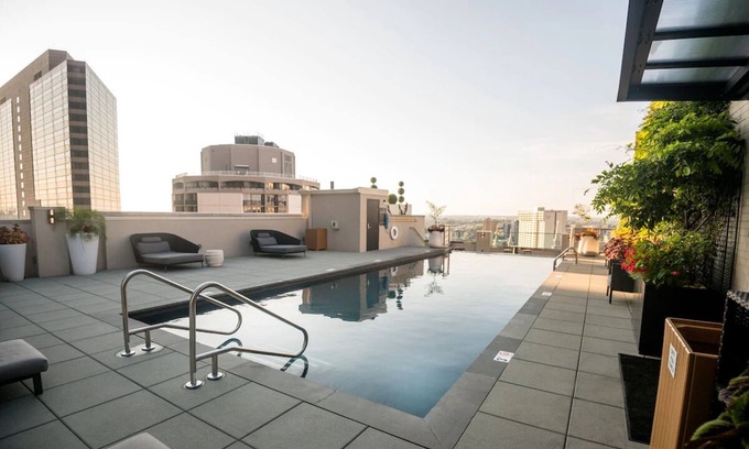 Logan Square House | Spacious Suite with Kitchen | City Views | Swimming Pool | Pet-Friendly