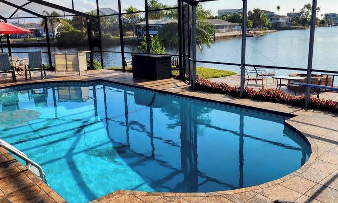Spring Hill House | Spacious Waterfront with heated swimming pool. 5-bedroom home in Hernando Beach