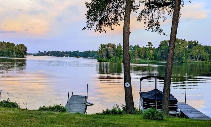 Chetek House | Spacious Waterfront with large deck, 2 Docks and Bar/game room