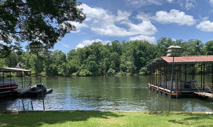 Mid America House | Spectacular lake front home. Private fishing deck and covered boat slip