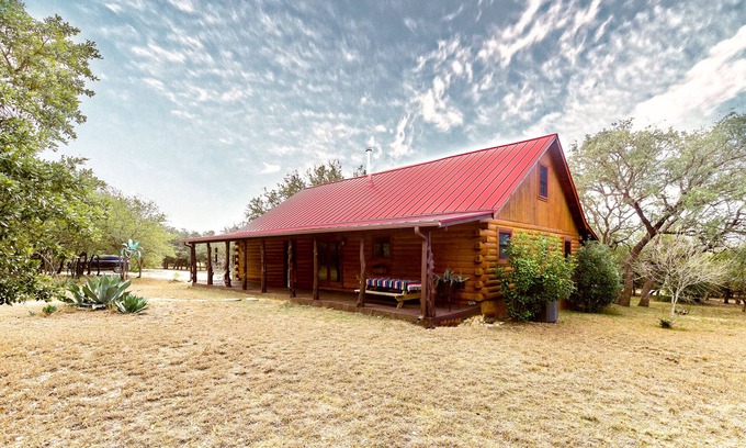 Dripping Springs House | Spectacular Log Cabin on 10 Acres in Dripping Springs