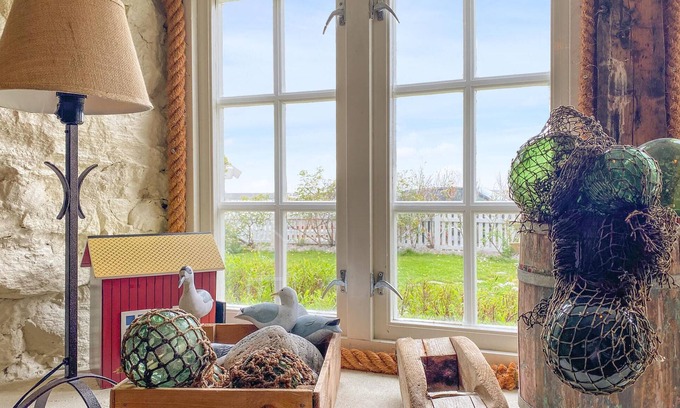 Giske House | Spend a wonderful vacation close to nature in this vacation home near the sea.