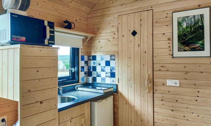 Haller House | Spend your holiday with your loved ones in this modern and compact holiday home.