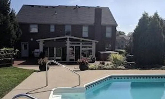 West Chester House | Splash and Soak Oasis with Pool and Hot Tub
