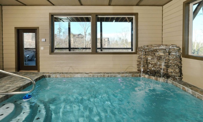 Sevierville Cabin | Splashin' Mountain Retreat - Sip Cocktails Fireside, Swim with Fountains & Project Movies!