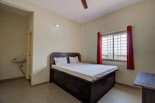 Beltola Hotel | SPOT ON R D Homestay 1