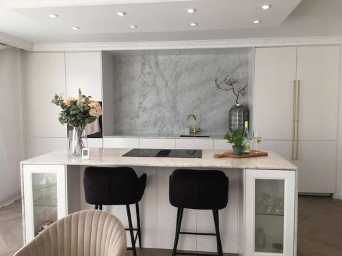Halmstad Villa | Stan- och strandnära poolvilla.