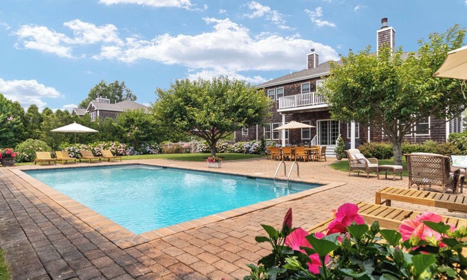 Southampton House | Stately traditional home with open floorplan and private pool in coveted.