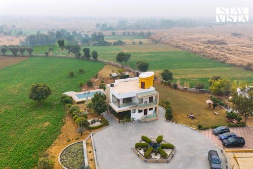 Rajawas Villa | StayVista at The Saket Farm with Pool, Bonfire