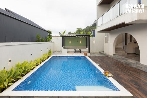 Khodala Villa | StayVista at Zenith Palms