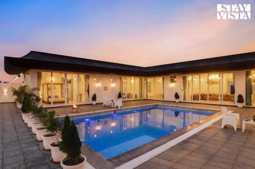 Jaipur Villa | StayVista's Kundan Villa - Pet-Friendly Villa with Sprawling Lawn, Outdoor Pool
