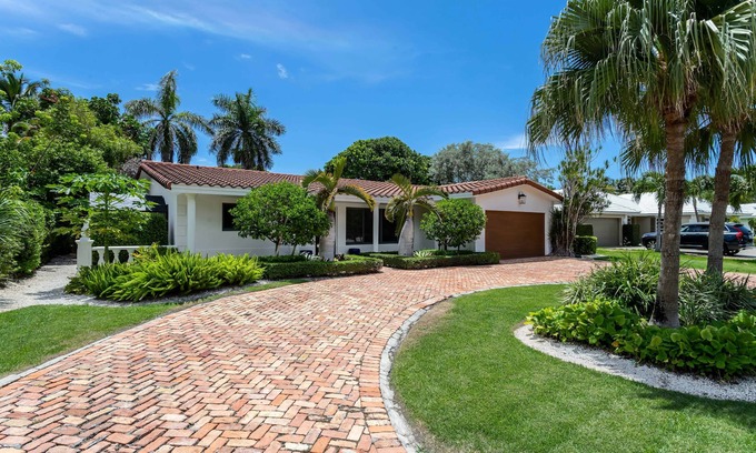 Boca Raton House | Steps from the beach, heated pool, and ocean sunrises from your patio