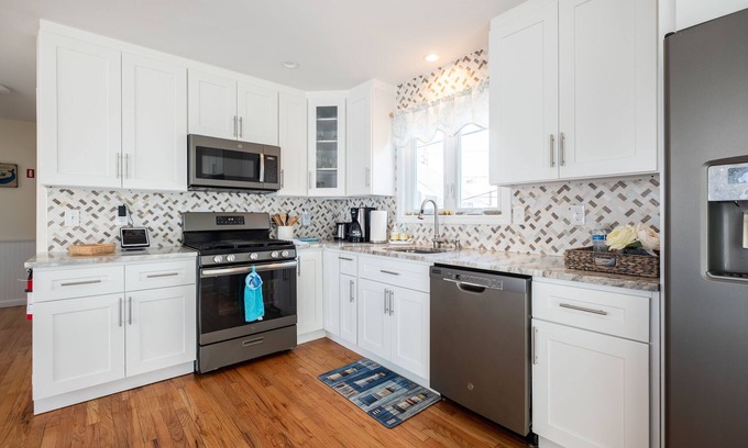 Fairfield House | Steps from the beach with water views!