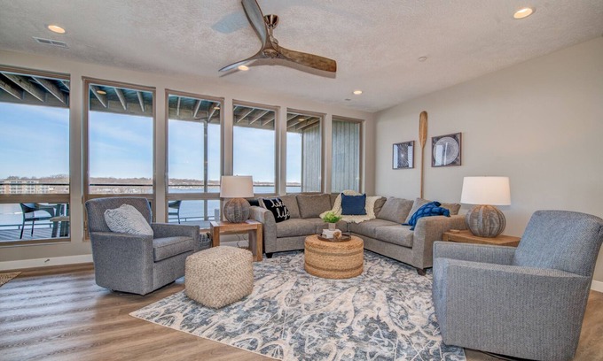 Arnolds Park Condo | Stillwater condo with East Lake Okoboji views!