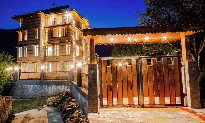 Manali Ski Chalet | Stone and wood cosy chalet admist apple garden with a beautiful law