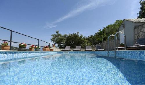 Dol House | Stone Dalmatian House Modern, Stylish with Pool