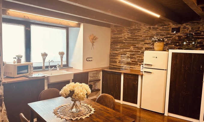 Samos House | Stone house with rural charm