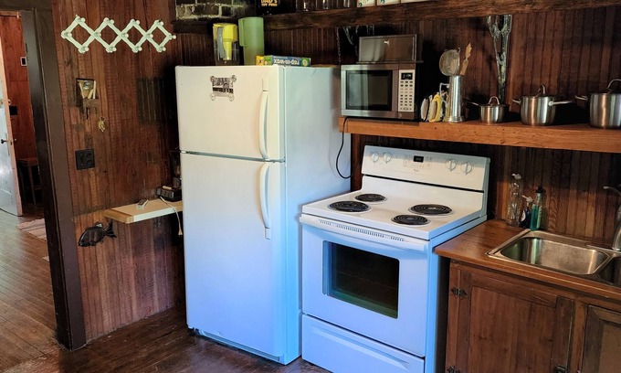 Solon Springs Cabin | Stone Lodge: Authentic Northwoods Charm A Stone's Throw from the Lake.