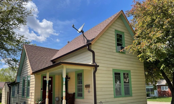 Pella House | Story and a half home less than a block from Pella's town square.