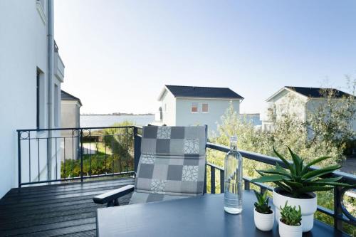 Fehmarnsund Apartment | Strandresidenz Vogelflug App 12