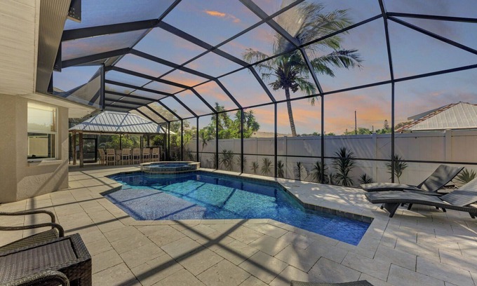 Palma Sola House | Stuck on 'Cation: Pool, Spa, Outdoor Kitchen, Screened Lanai by Anna Maria Life Vacation Rentals