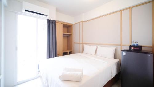Sidoarjo Apartment | Studio Apartment at Suncity Residence Sidoarjo near Suncity Mall By Travelio